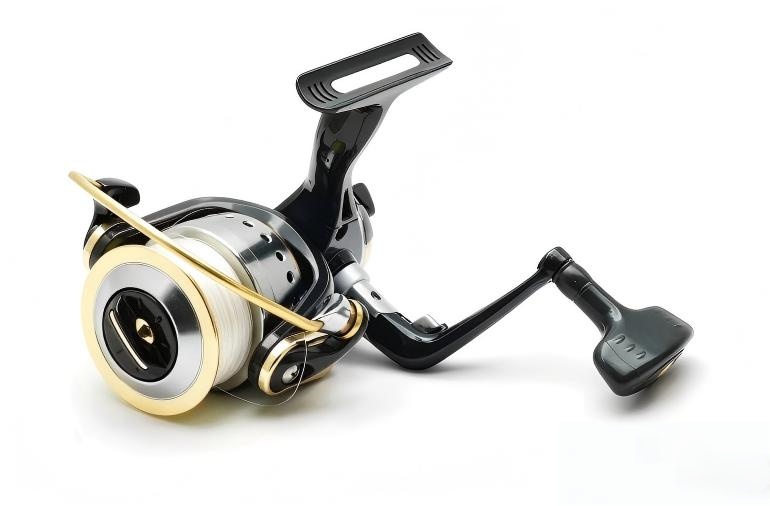 &nbsp;High-quality spinning reel with white fishing line, featuring precision ball bearings for smooth performance.jpg